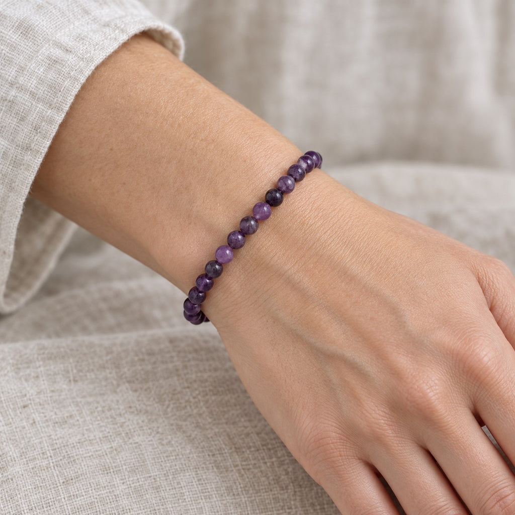 Amethyst Calm Bracelet - worn or held for scale