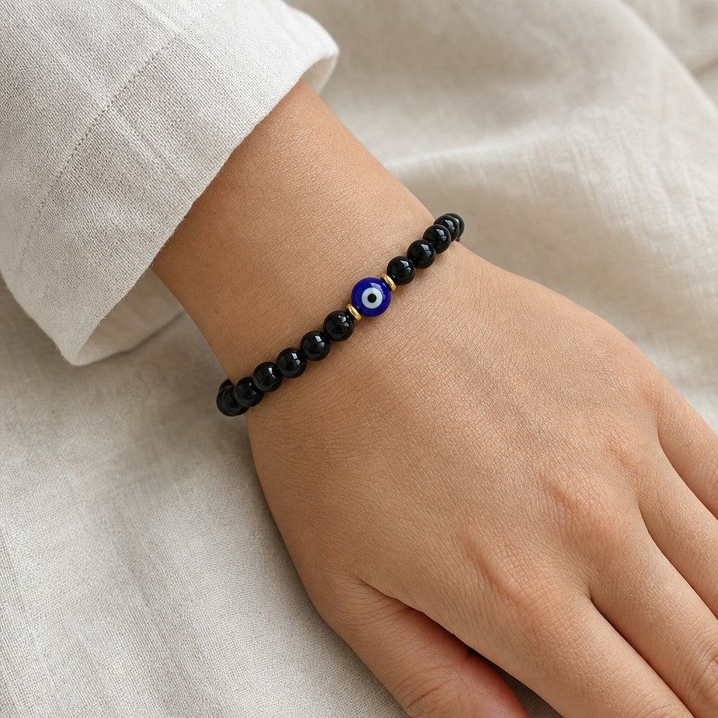 Evil Eye & Black Tourmaline Bracelet - worn or held for scale