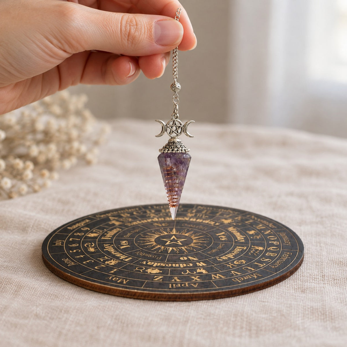 Spirit Pendulum + Divination Disc - held in hand for scale