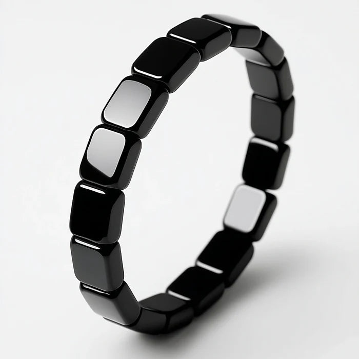 Black hematite bracelet with polished beads, featuring a sleek design from the Ironmark HEMATITE BRACELET collection.